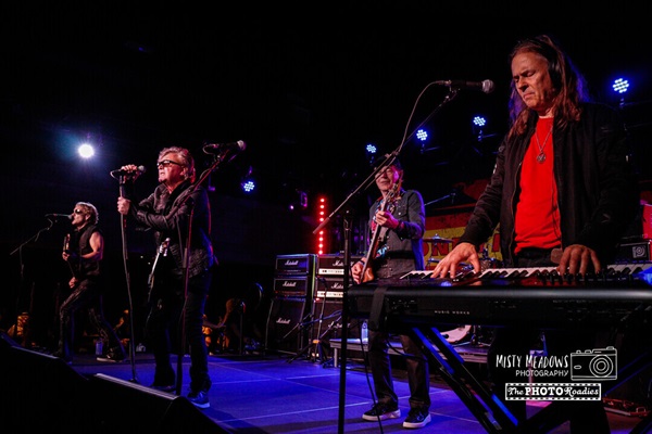 Music group performing at a concert