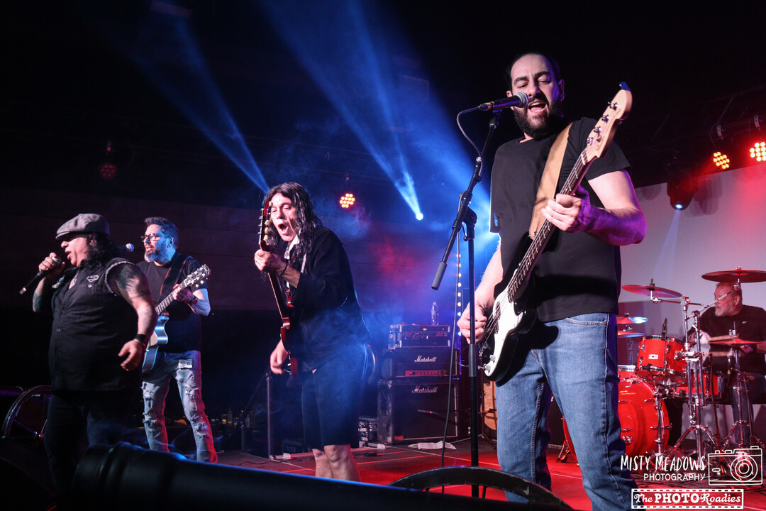 Man playing guitar on stage